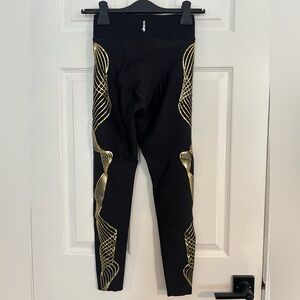 ULTRACOR Lux Ultra High Leggings Black w/ Gold foil swirls down sides Size M